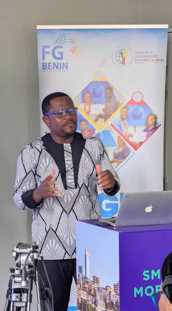 A man stands and speaks at a podium